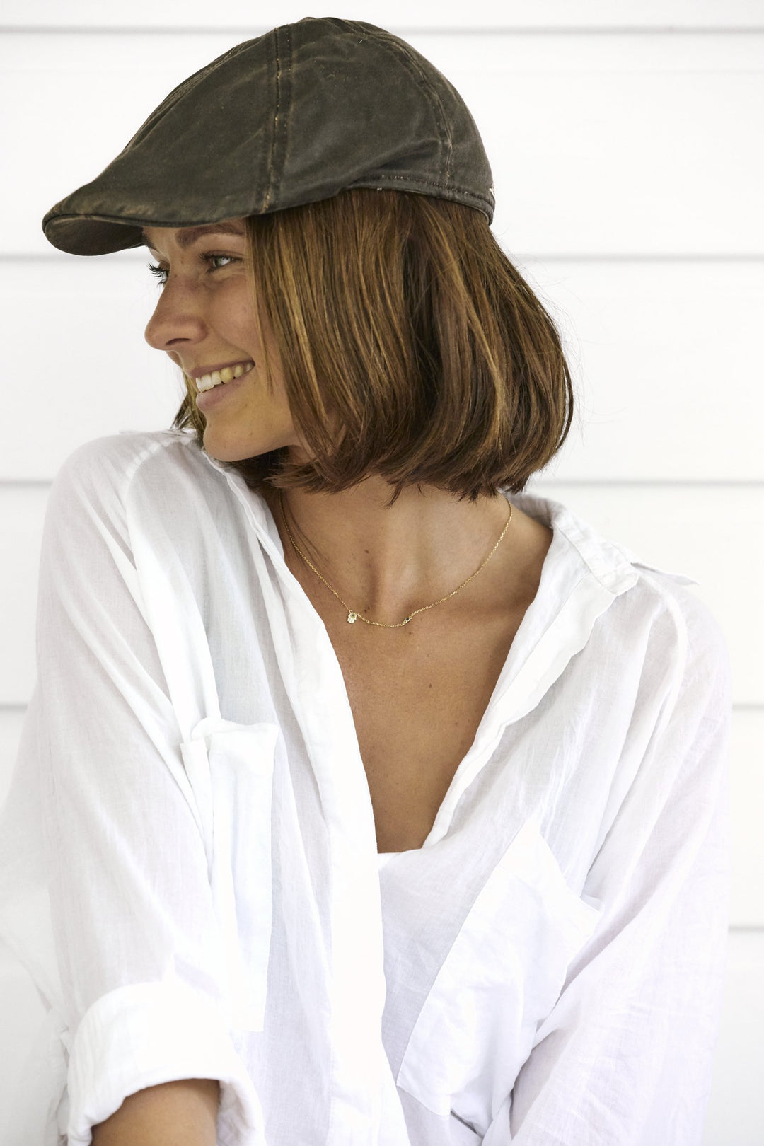 Woman wearing the Merrik hat by Conner Hats