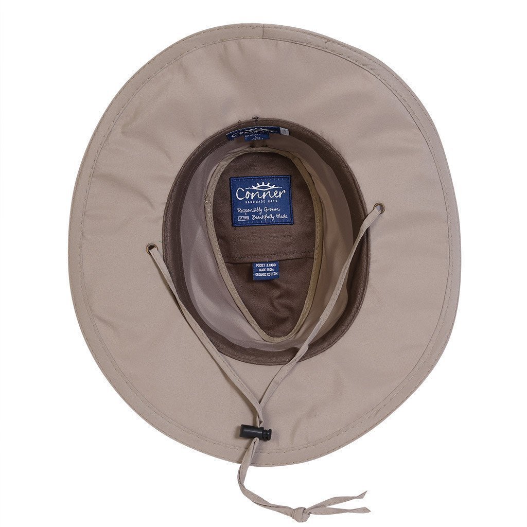 Inside view of lightweight cloth hiking sun protection hat with chin cord in outback outdoor style showing inner organic cotton band and secret pocket and Conner labels also made from organic cotton and printed with vegetable dyes