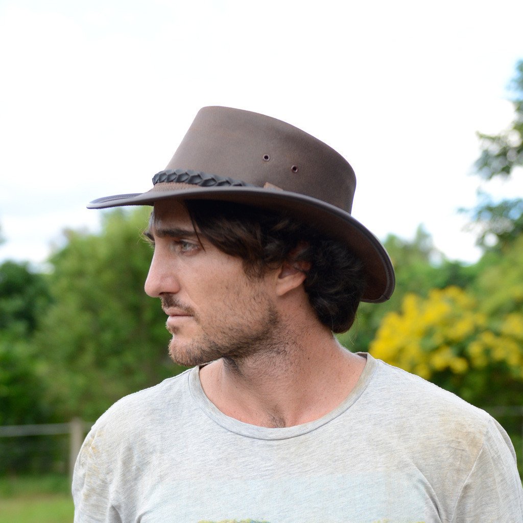 Man outside in Aussie Bac Pac Traveller hat Handmade in Australia by BC Hats made from genuine oliy waterproof leather in color Brown