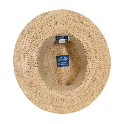 Inside view of and crocheted raffia straw sun hat showing inner soft terry stretch band and Conner labels made from organic cotton