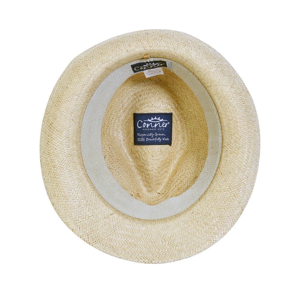 Inside view of Panama style straw fedora hat showing soft terry inner band and organic cotton inner labels