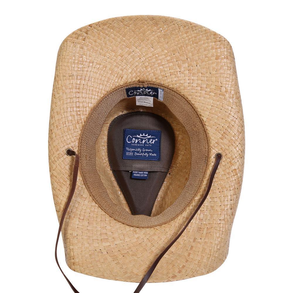 Inside view of hand braided raffia straw western hat with a leather chin cord showing inner terry band and organic cotton sercret pocket and Conner labels