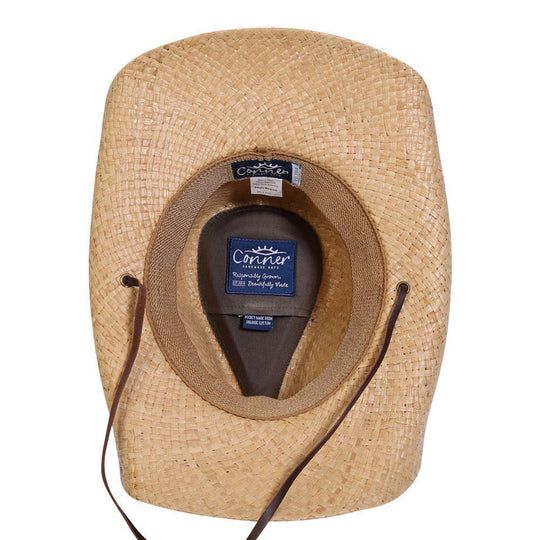 Inside view of hand braided raffia straw western hat with a leather chin cord showing inner terry band and organic cotton sercret pocket and Conner labels