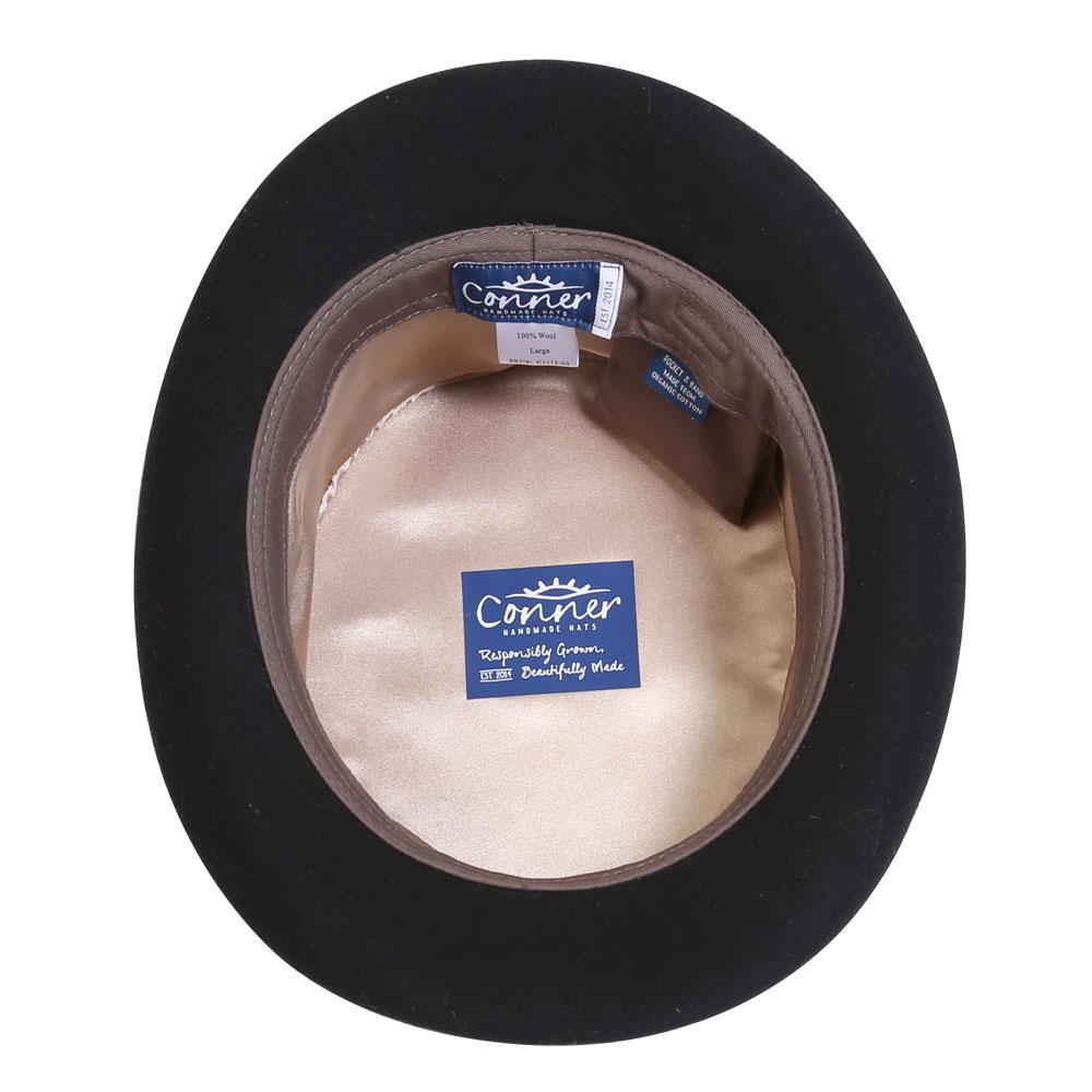 Inside view of Steampunk wool top hat showing organic cotton inner band and secret pocket and satin lining