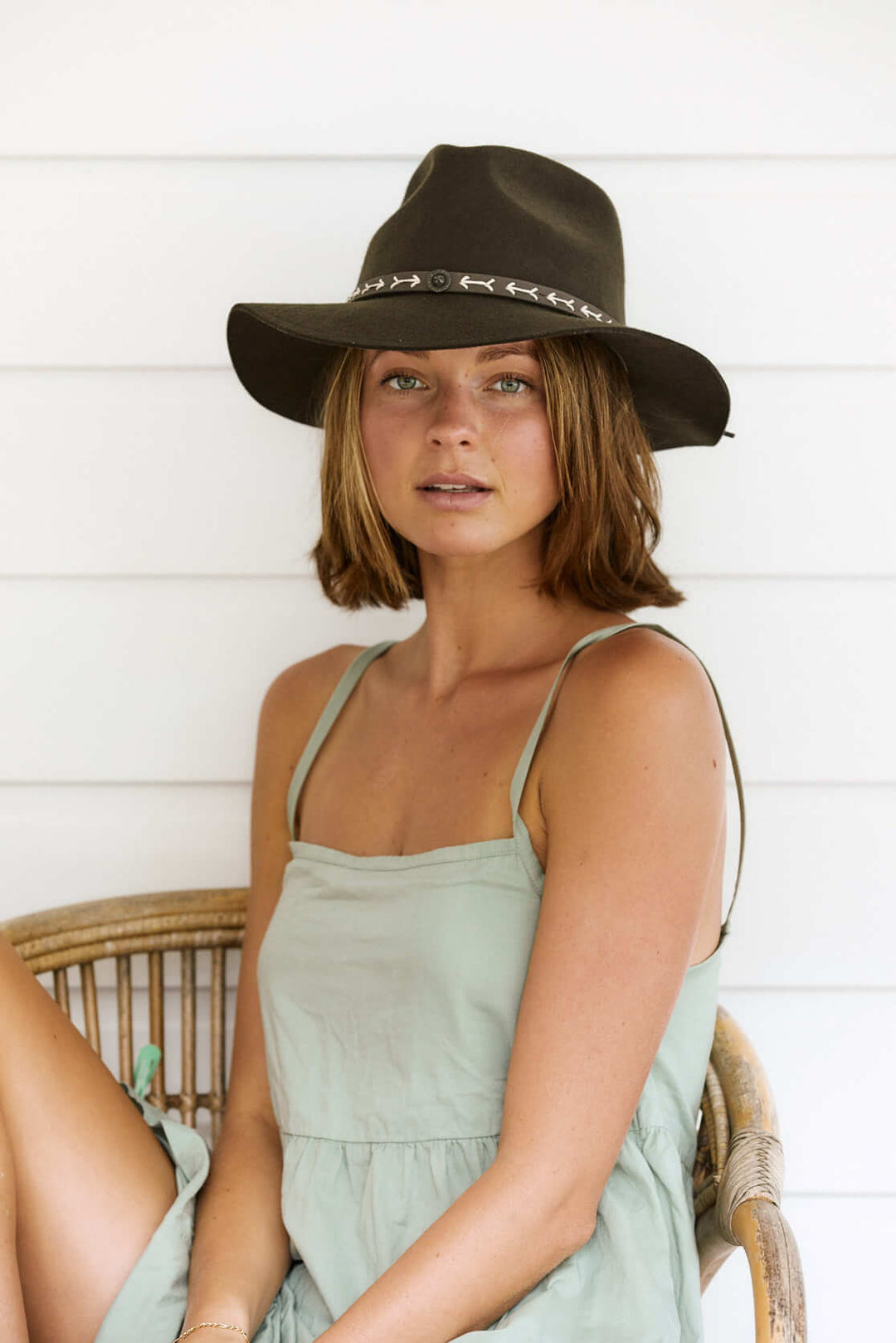 Woman wearing wool boho retro style hat in color Chocolate